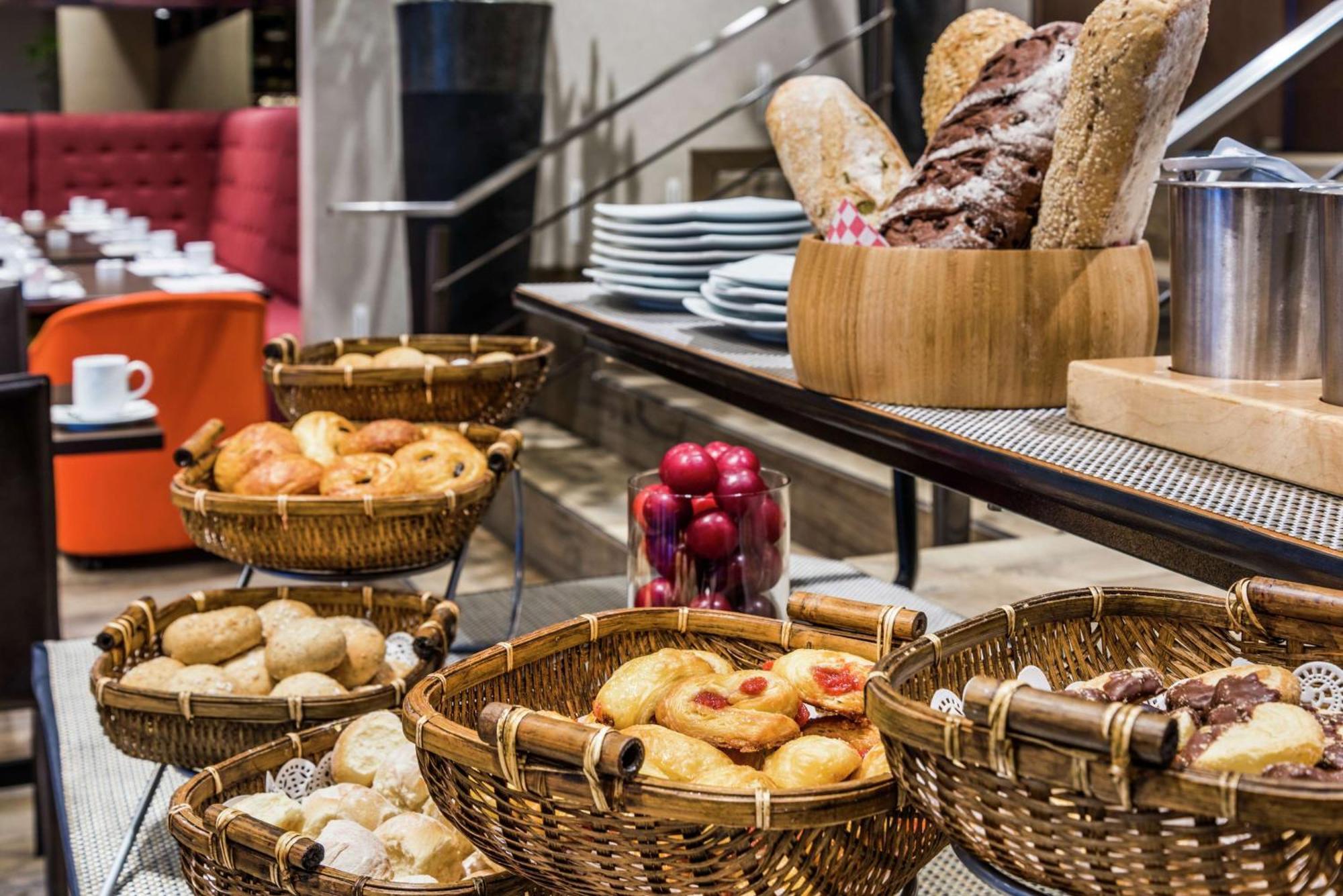 Embassy Suites By Hilton Bogota - Rosales Exterior photo Breads and pastries at a buffet