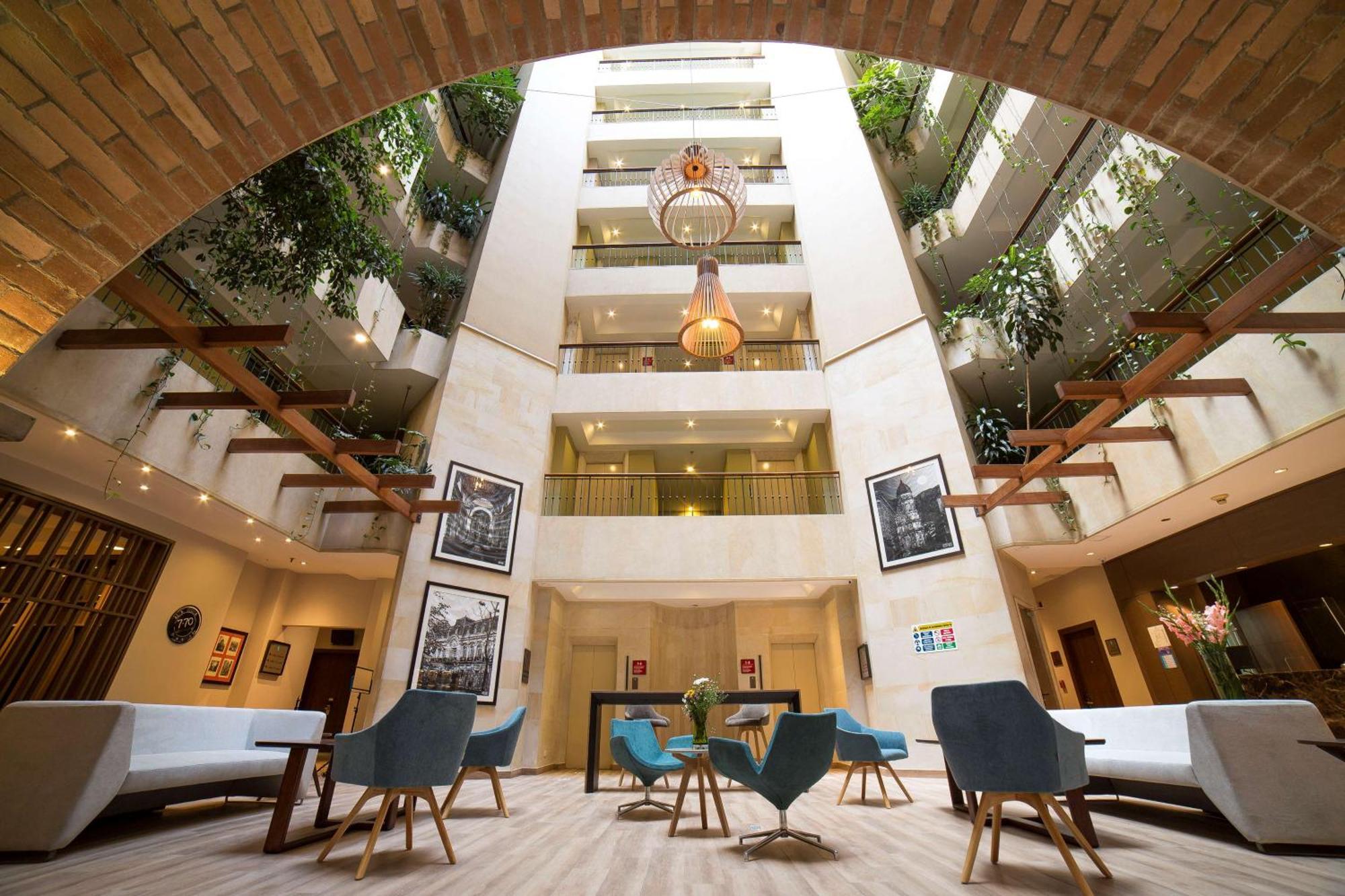 Embassy Suites By Hilton Bogota - Rosales Exterior photo The hotel's atrium